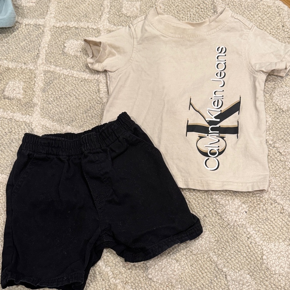 Baby boys Calvin Klein Jeans Cream T-Shirt and Black dress Shorts Set